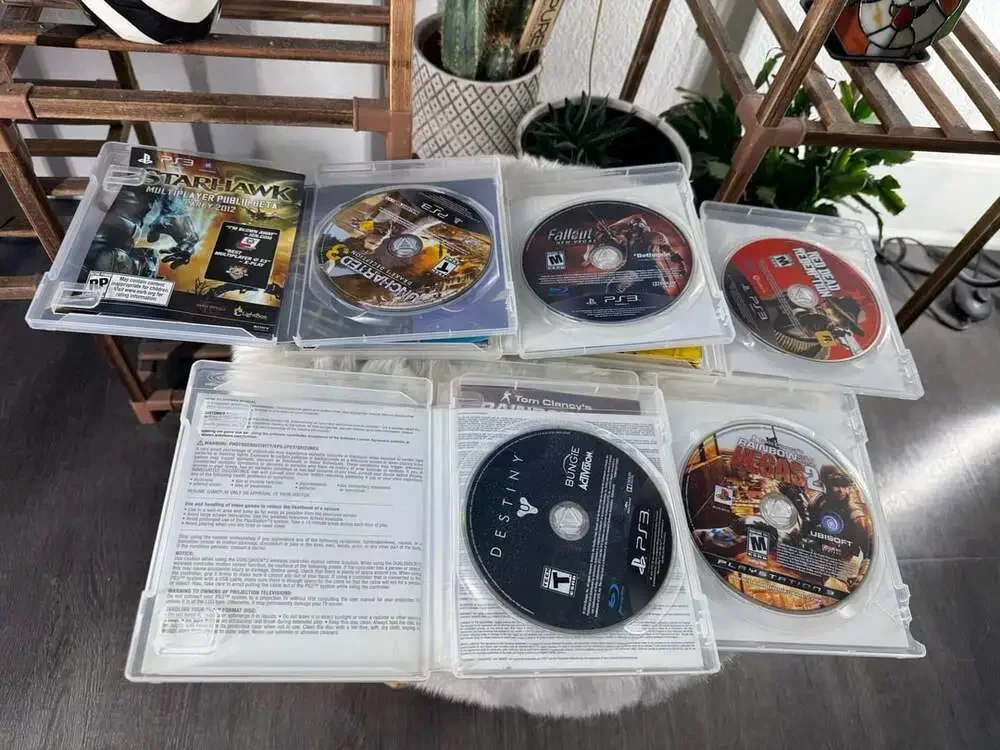 Sony PlayStation 3 Slim 160GB Console Bundle with Games and Controller